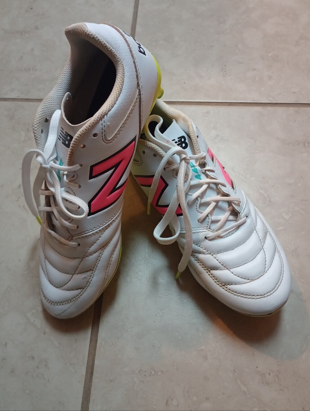 New Balance 442 White Soccer Cleats with Pink Accents and Neon Yellow Studs